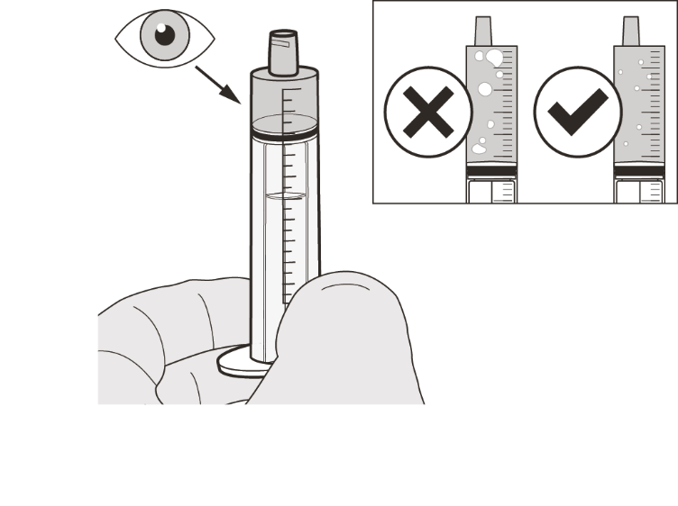 A syringe being held in a hand

Description automatically generated